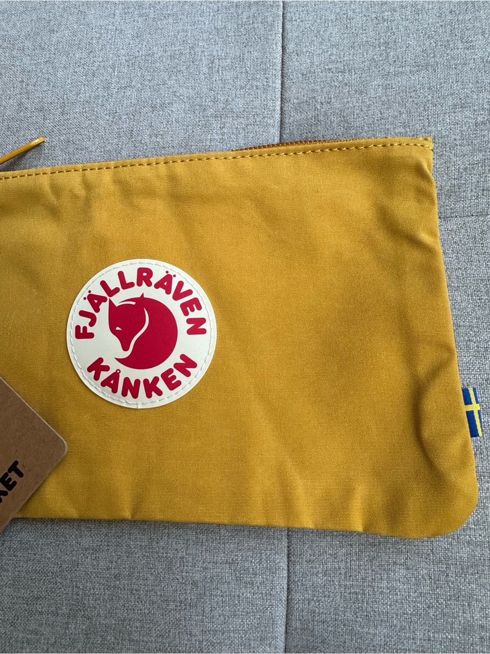 Fjallraven Kånken Pouch in Mustard Yellow with Red Logo